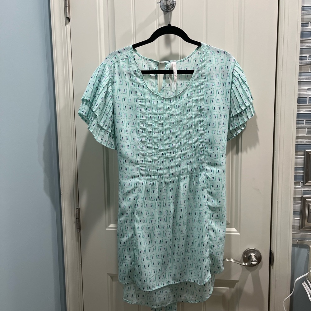 Melissa McCarthy Seven7 tunic-length top in size 2x. Aqua with blue pattern